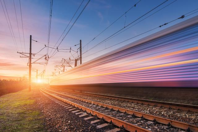 High speed train on tracks in motion.